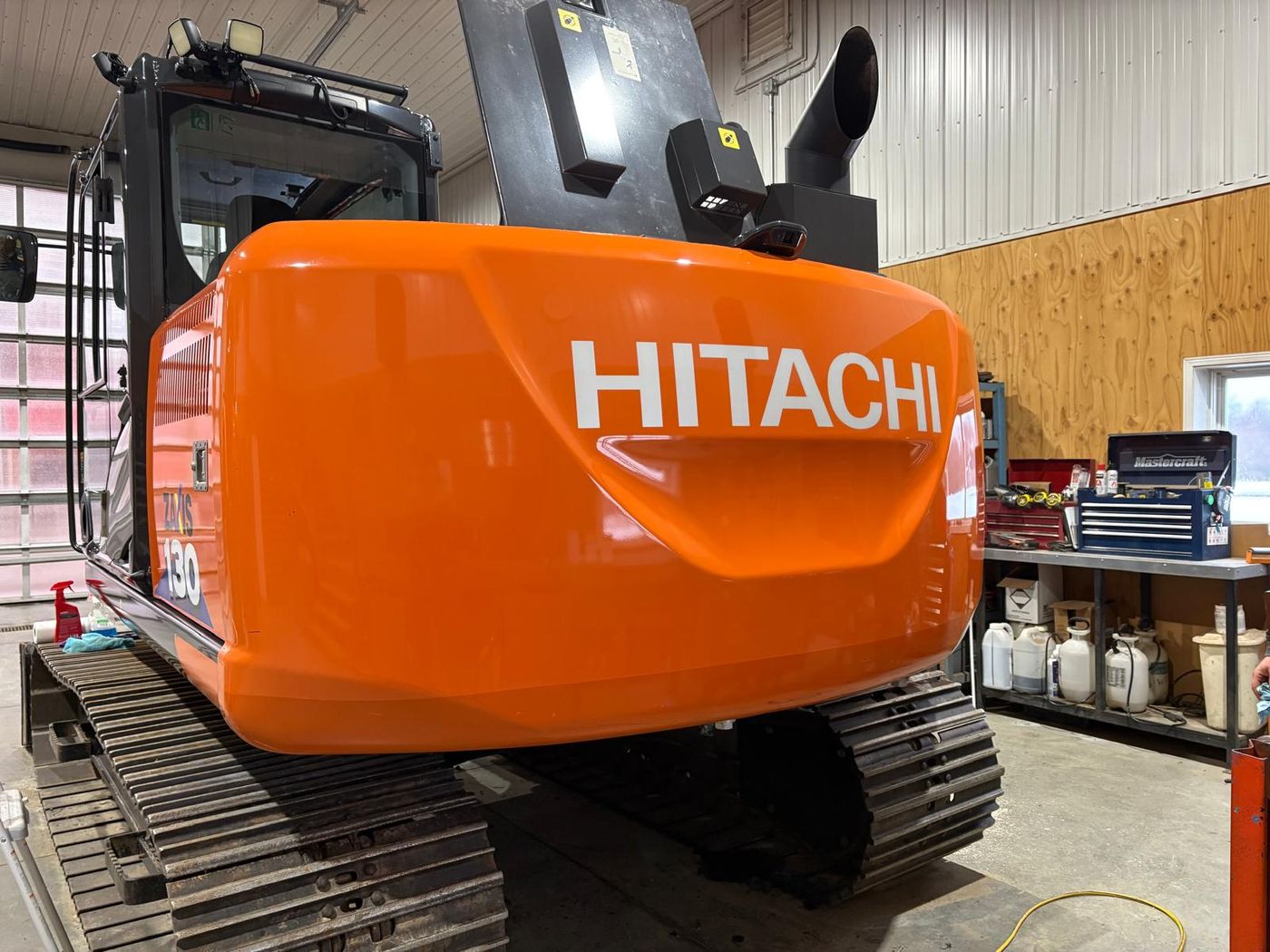 Hitachi ZX130 boom and cab after ceramic coating
