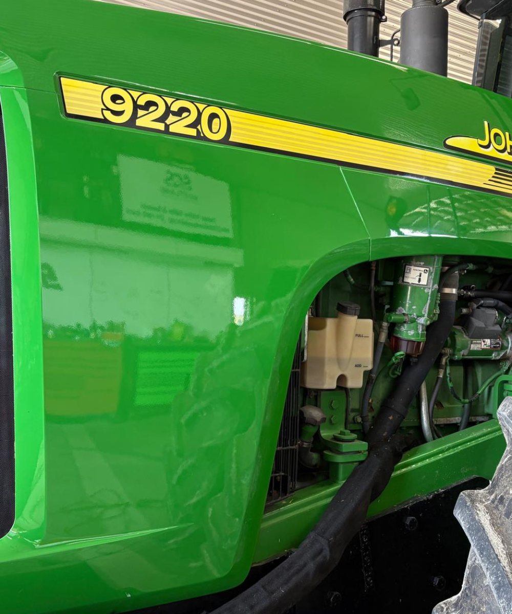 John Deere 9220 hood after cut, polish and ceramic coating, mirror gloss green paint