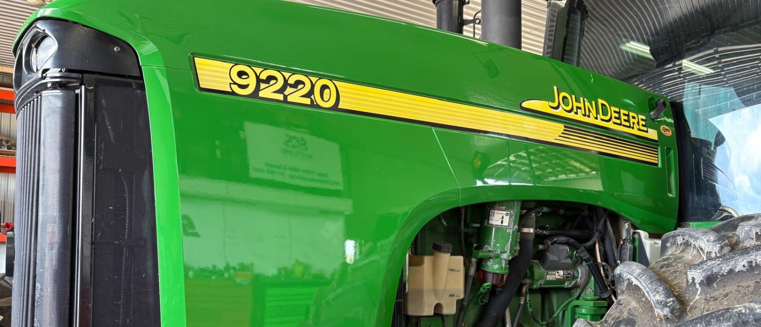 John Deere 9220 tractor hood after cut, polish and ceramic coating, mirror gloss green paint