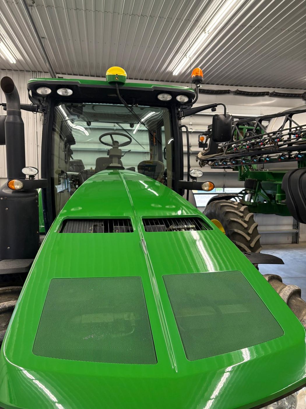 John Deere hood after cut, polish and ceramic coating, deep mirror gloss