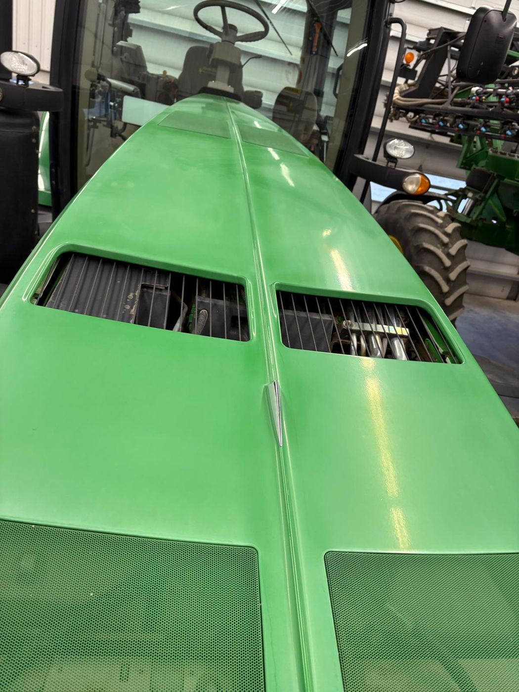 John Deere hood before polishing, faded oxidized green paint